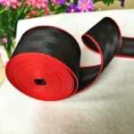 Premium black and red car seatbelt webbing roll for luxury vehicle interior customization available at Roh Accessoires Morocco.
